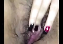 Iranian girl plays with her hairy juicy pussy